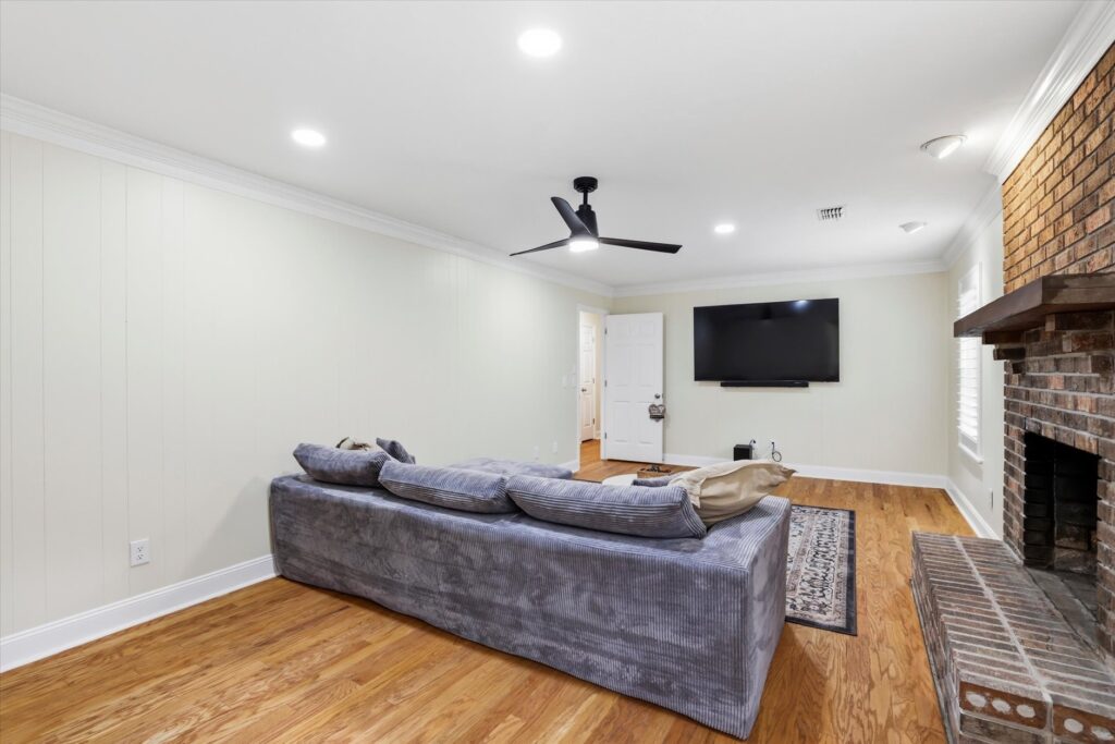 Living Room With Fireplace and TV